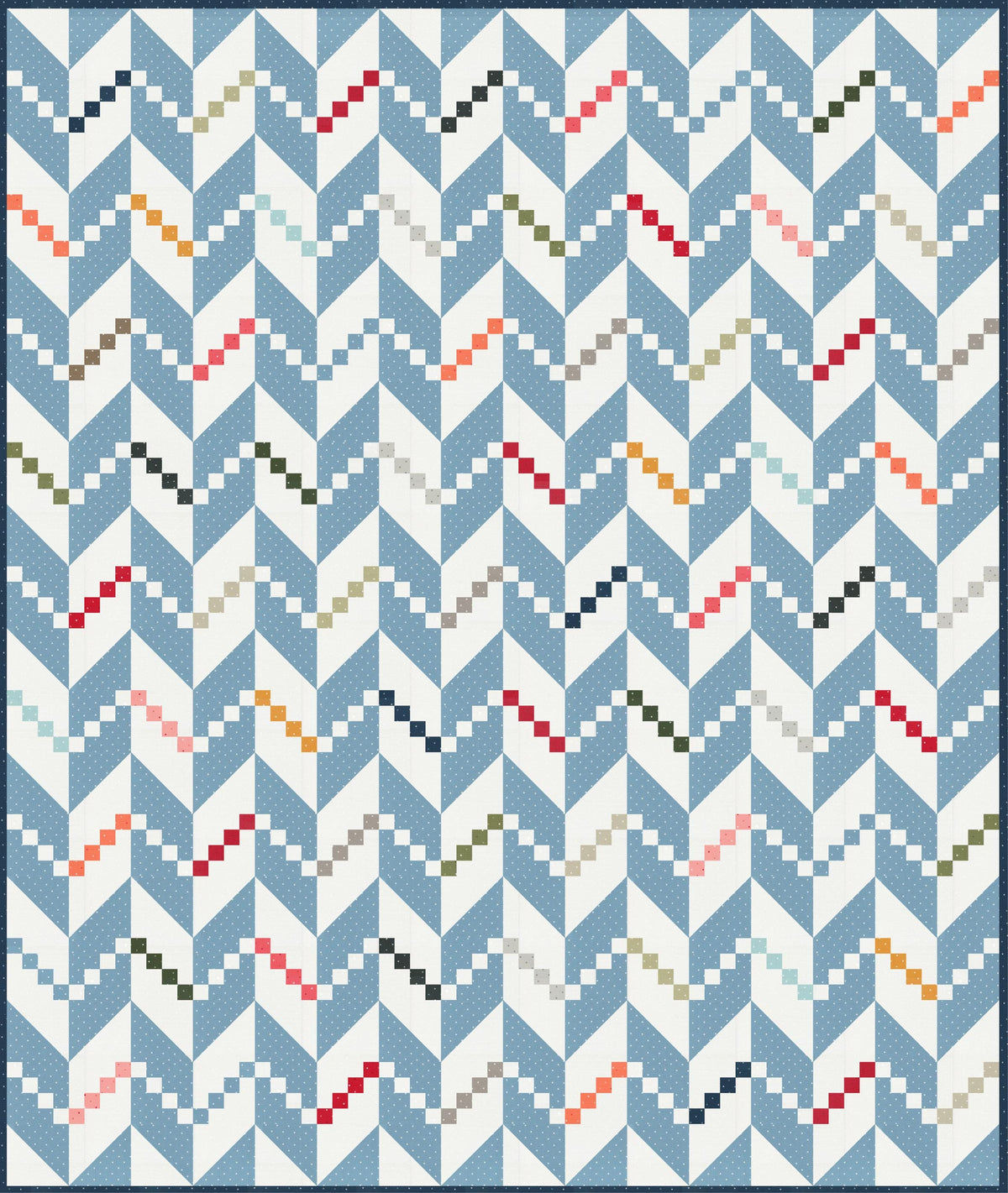 a blue and white quilt with a pattern on it