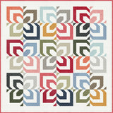 a multicolored quilt on a white background