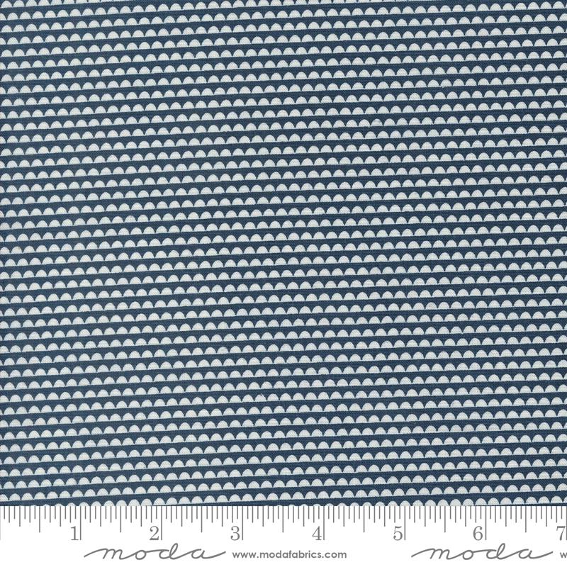 a ruler with a blue and white pattern on it