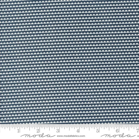 a ruler with a blue and white pattern on it