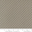 a ruler with a brown background with white circles