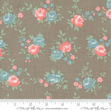 a brown background with pink and blue flowers