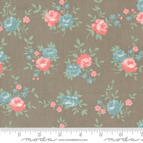 a brown background with pink and blue flowers