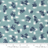 a blue and white flower pattern on a blue background