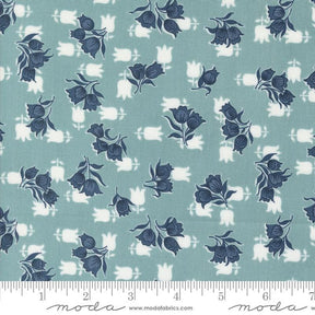 a blue and white flower pattern on a blue background
