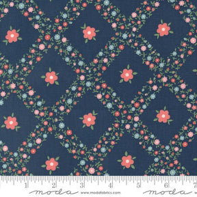 a blue background with pink flowers and green leaves