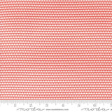 a pink and white background with a ruler