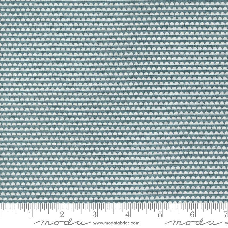 a ruler with a blue and white pattern on it