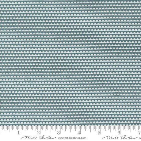 a ruler with a blue and white pattern on it