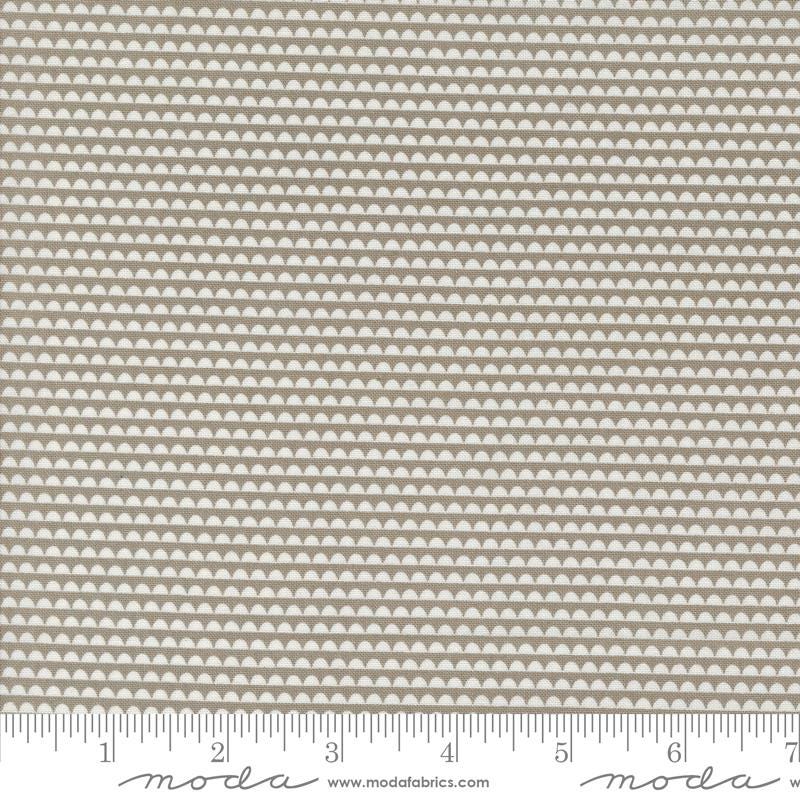 a beige fabric with a white background