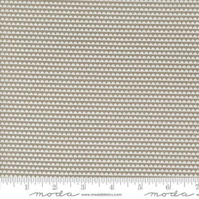 a beige fabric with a white background