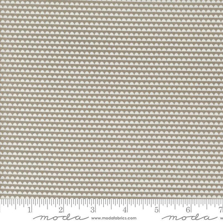a beige fabric with a white background