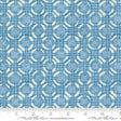 a blue and white fabric with circles on it