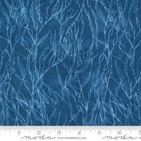a blue background with white branches on it