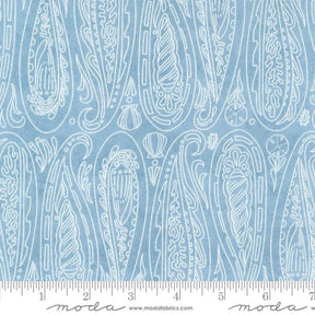 a ruler with a blue and white pattern on it