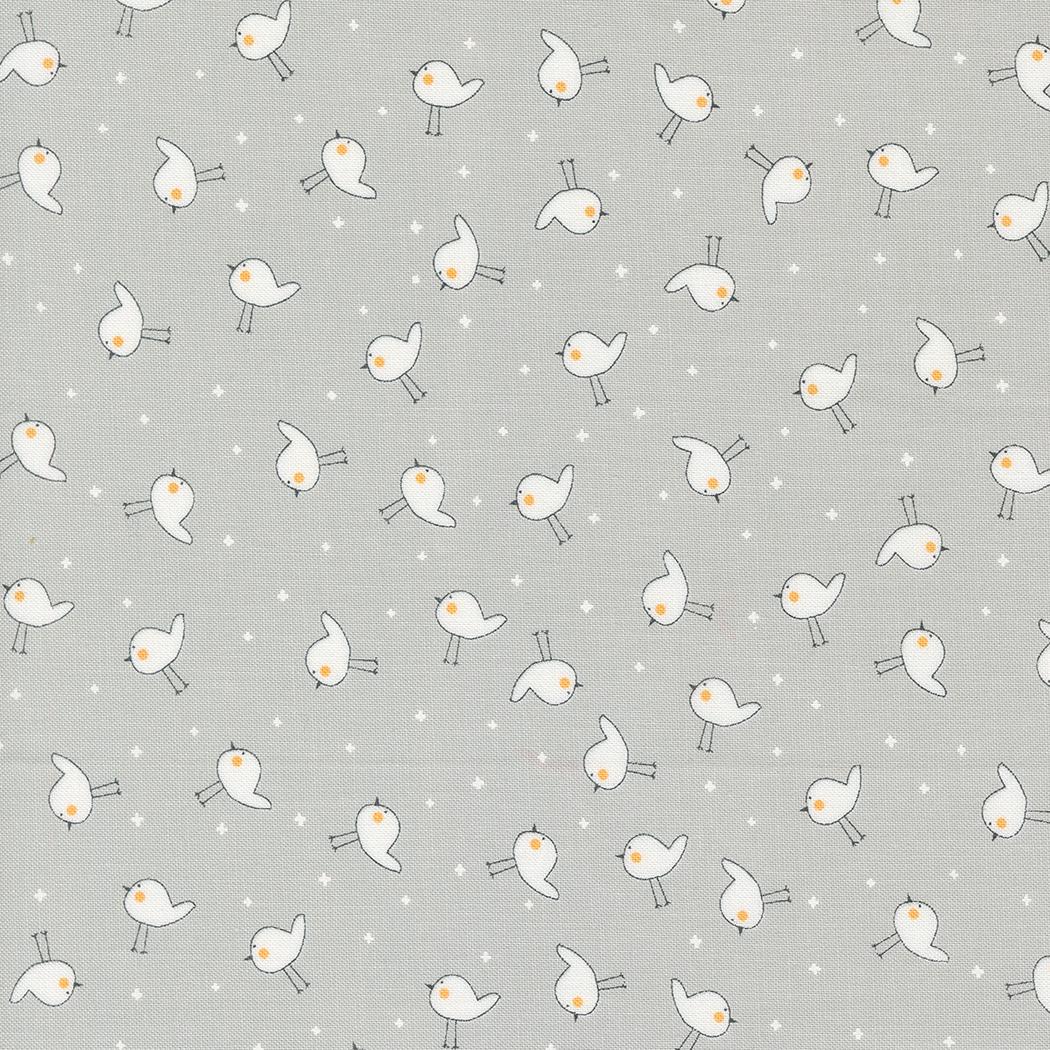a gray background with white birds on it