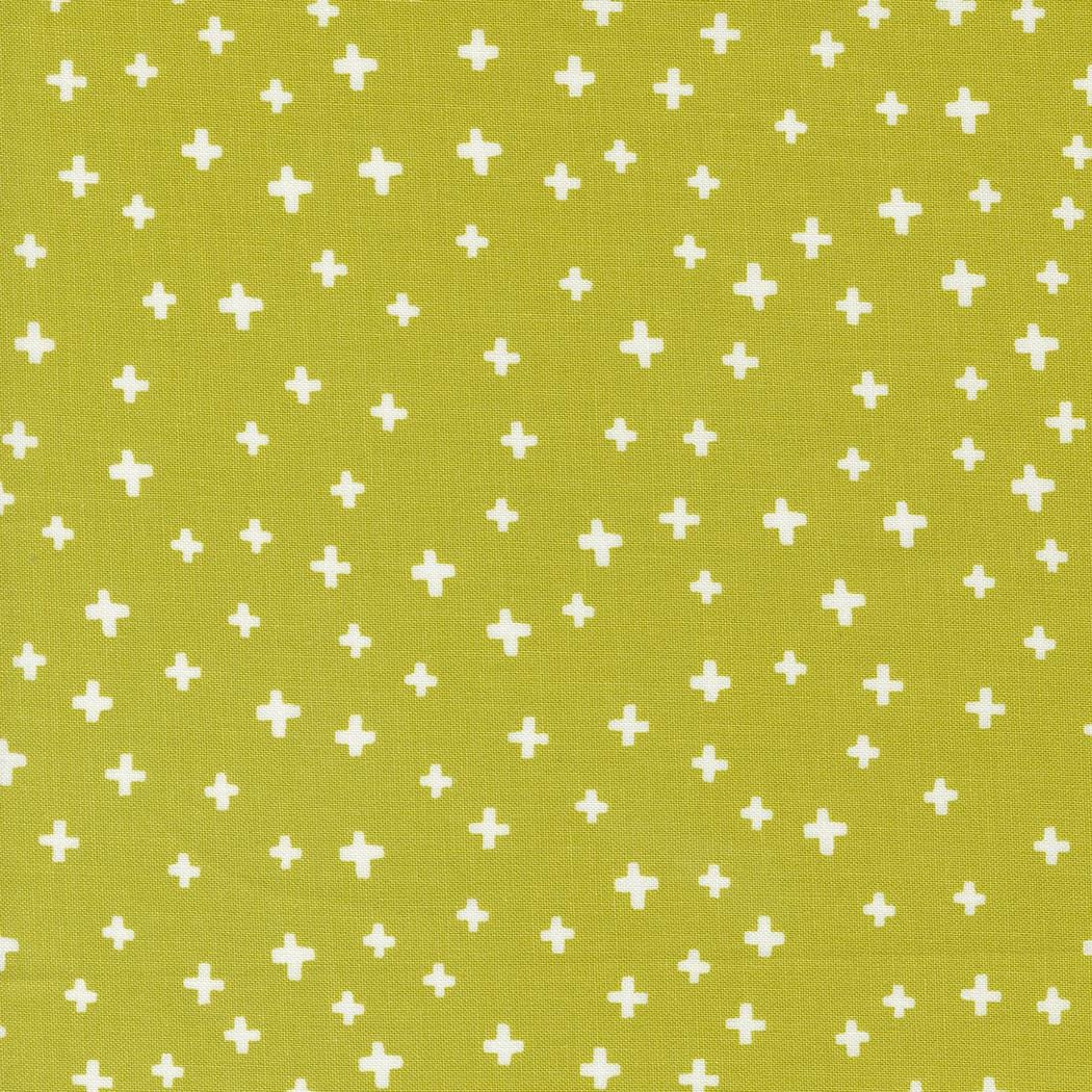 a green background with white crosses on it