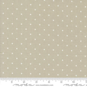 a ruler with a white polka dot pattern on it
