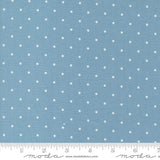 a blue background with white polka dots