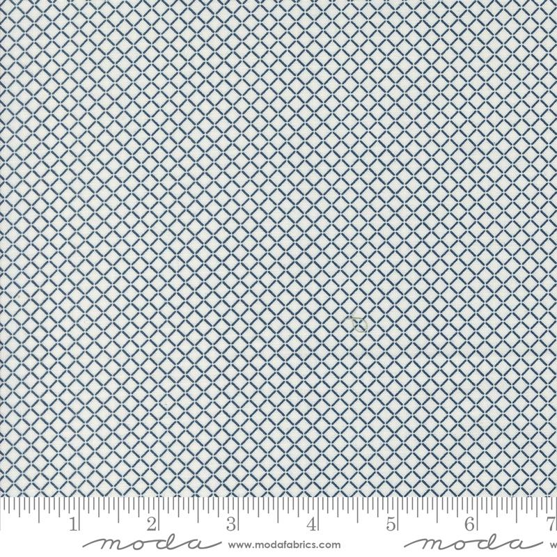 a ruler with a blue and white pattern on it