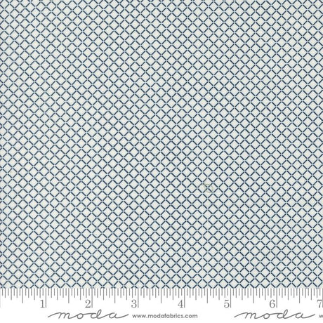 a ruler with a blue and white pattern on it