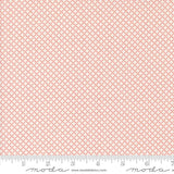 a ruler with a pink and white pattern on it