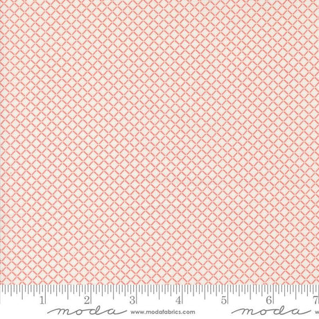 a ruler with a pink and white pattern on it