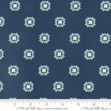a blue fabric with white stars on it