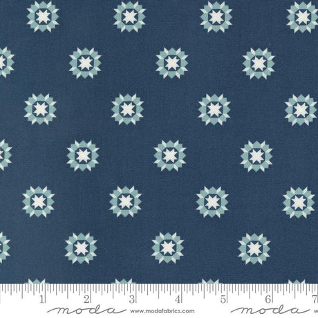 a blue fabric with white stars on it