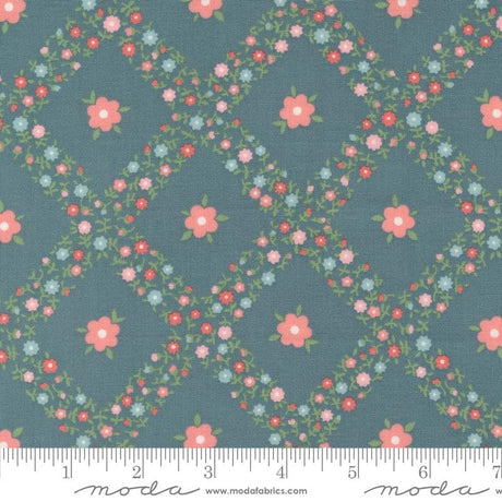 a blue background with pink and blue flowers