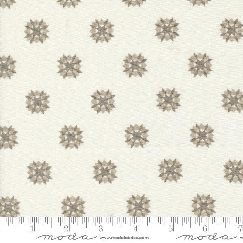 a white and brown flower pattern on a white background