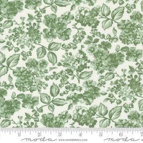 a green and white floral print on a white background