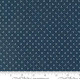 a ruler with a blue background with white circles