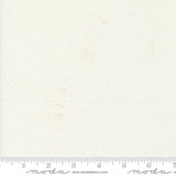 a ruler with a piece of paper on top of it