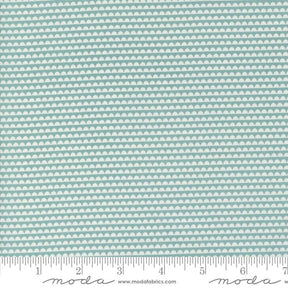 a ruler with a blue and white pattern on it