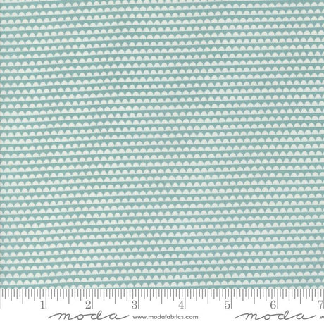 a ruler with a blue and white pattern on it