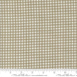 a beige and white checkered fabric with a ruler