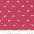 a red fabric with white birds on it