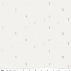 a white and gold wallpaper with small trees on it