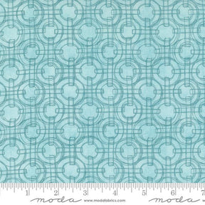 a blue fabric with circles and lines on it