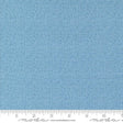 a blue fabric with a ruler in front of it