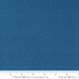a blue fabric with a ruler in front of it