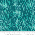a blue and green fabric with leaves on it