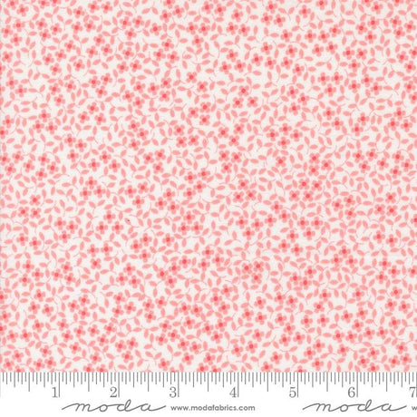 a ruler with a red flower pattern on it