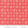 a red background with pink flowers and green leaves
