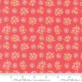 a red background with pink flowers and green leaves