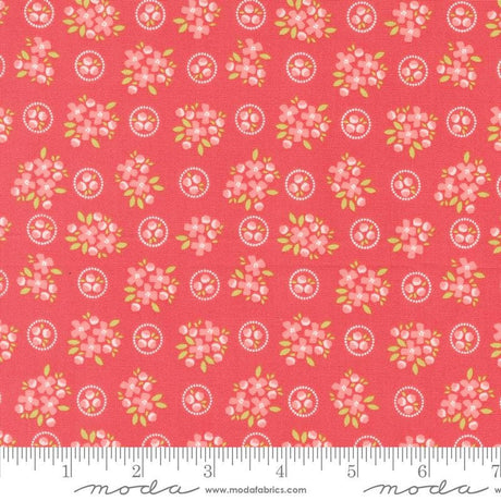 a red background with pink flowers and green leaves
