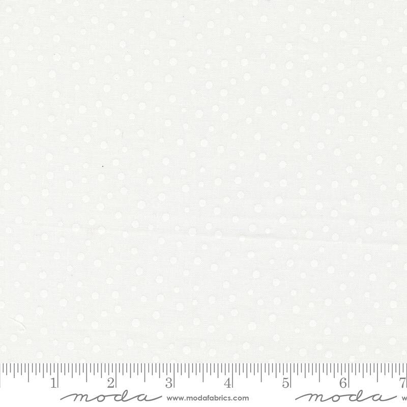 a ruler with a white background with white polka dots