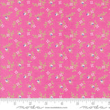 a pink fabric with small flowers on it