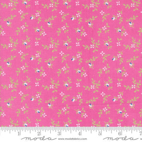a pink fabric with small flowers on it